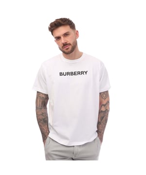 Mens Burberry Harriston Logo Print T- Shirt in white.- Ribbed crewneck.- Short sleeves.- Printed Burberry lettering at front.- Regular fit.- 100% Cotton.- Ref: 8055309