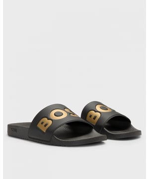 Signature slides made in Italy by BOSS Menswear. Crafted in lightweight materials, this summery pair has a large BOSS logo on the upper.

Fastening top: Slip-on
Partially lined

Upper material: 98% Polyvinyl chloride, 2% Polyurethane, Lining: 100% Polyester, Sole: 70% Polyvinyl chloride, 30% Thermoplastic polyurethane, Innersole: 70% Polyvinyl chloride, 30% Thermoplastic polyurethane
50536835
 