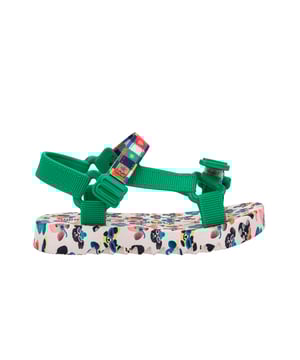 Experience unmatched fun and fashion with the Mini Melissa Playtime + Fabula - the sport sandal (papete) you never knew your mini desperately needed! The silhouette and has treaded soles and velcro straps with M logos. The insoles feature a unique, colorful print that is the perfect extra detail for a sunny day.
