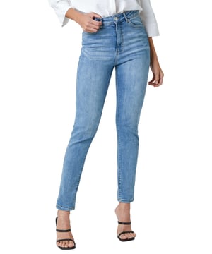 Slim Leg Stretch Mom Jeans from Roman. These high waisted vintage wash mom jeans will be your new best friend, another essential piece to add to your everyday wardrobe. Featuring belt loops around the waist and an ankle grazing hem length, these jeans even come with a 5 pocket design because who doesn't love pockets! Pair with a plain top for a casual everyday outfit or dress them up with heels and an off the shoulder top for a spring evening inspired look.