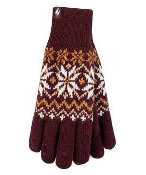 Guantes térmicos Heat Holders Cuando hace frío, necesitas un buen par de guantes térmicos para mantener los dedos calentitos. Por eso Heat Holders ha creado estos guantes extra cálidos con su forro polar térmico de felpa llamado Heatweaver. Este forro suave y sedoso no sólo proporciona un tacto lujoso, sino que también te asegura unos dedos acogedores en el crudo invierno. El forro Heatweaver maximiza la cantidad de aire caliente que se mantiene cerca de la piel para garantizar que los dedos no se enfríen. La capa exterior está fabricada con el hilo desarrollado por Heat Holders, un aislante de alto rendimiento que mantiene el aire caliente dentro y el frío fuera. Además, transpira mejor la humedad. Los guantes Heat Holders también tienen un puño extensible que se despliega para crear una manga protectora que abraza la muñeca para un ajuste seguro, asegurando que no haya ningún hueco frío entre sus muñecas y sus mangas, con nervaduras elásticas para mantenerlos seguros y cerca de su piel. Gracias a estas características, estos guantes tienen una clasificación TOG de 2,3, lo que garantiza su calidez en los fríos del invierno. Estos guantes están disponibles en las tallas Pequeña/Media y Mediana/Grande y en 5 colores a elegir. Detalles del producto - Guantes térmicos - 2.3 tog - Forro Heatweaver - Puño térmico - Canalé elástico - S/M - 5 colores - Hilo térmico - Patrón Fairisle - Extra cálidos
