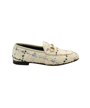 The Jordaan is a shoe that has a modern finish and a signature appeal. It has an elongated toe and the Gucci Horsebit motif gracing the uppers. This pair in off-white is crafted from tweed and sewn with utmost care to envelop your feet with luxury | Exquisite and well-crafted, these Gucci loafers are worth owning. They have been crafted from Tweed and they come flaunting a White shade with Horsebit details on the uppers. The loafers are ideal to wear all day.
*Comes with box and dust bag

Gucci Horsebit Jordaan Loafers in Off-White Romantique Tweed 
Material: Tweed
Color: Off-White
Size: IT35.5
Condition: New with tag
Sign of wear: No
SKU: 276151