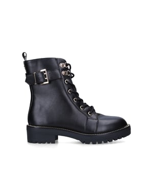 The Taya2 ankle boot arrives in black with gold hardware details around the upper and buckle strap. The back of the ankle features the bold, contrast colour KG Kurt Geiger logo printed on ribbed textile with a print stitch detailing. Sole height: 4cm. Concealed zipper on the inner side. This product is registered with The Vegan Society