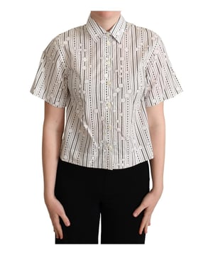 Nuevo con etiquetas  
Polo de algodón Dolce & Gabbana 100% auténtico  
Diseño geométrico  
Cuello y tapeta de botones en la parte delantera  
Mangas cortas  
Hecho de 100% algodón  
Disponible en colores negro y blanco  
Detalles del logo  
Hecho en Italia  
Material: 100% algodón