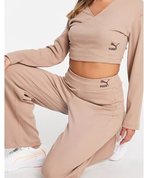 Wrap front long sleeves logo embroidery to side cropped length and regular fit.