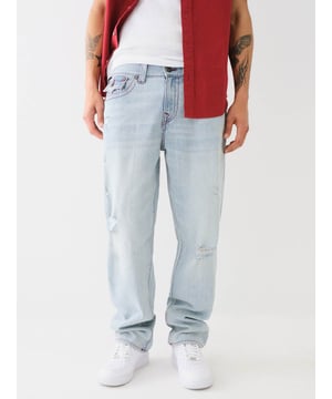 The Bobby Distressed Baggy Jean is giving us 90’s nostalgia. This men’s jean features a relaxed fit, distressing, whiskering, and red single needle stitching. Finished with back horseshoe detailing on the back flap pockets and a shorter 32” inseam. 