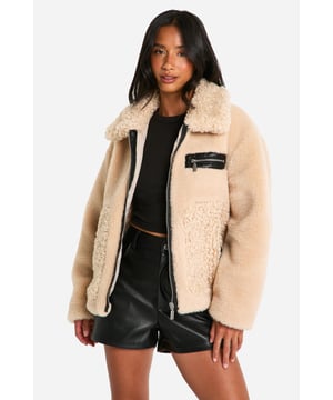 Keep toasty this season with our collection of petite coats and jackets. From petite trench coats to petite teddy coats, our coats for petite women are specifically designed to fit all you girls sitting pretty at 5'3'' and under. Step out in a petite blazer or pass the vibe check in a petite puffer jacket. Whatever your style, we've got you, girl. This one would look dreamy with a pair of straight leg jeans, an oversized hoodie and chunky trainers.Style: Teddy CoatLength: RegularSleeve Length: Long Sleeve