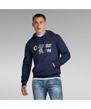 Gepolsterte Kapuze - gekreuzte Vorderseite - Kordelzug. Lange Ärmel - gerippte Bündchen. Kängurutasche. Gerader Saum, gerippte Abschlüsse. G-Star RAW Grafikdruck auf der Brust. Kein Verschluss. Dieses Modell ist aus einem weichen Sweat-Stoff mit einer Frotteeschlaufe auf der Innenseite. Weicher Sweat-Stoff. Glatte, gleichmäßige Textur