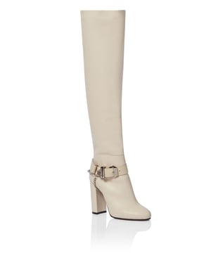 Steigbügelstiefel aus Leder mit Hirschdruck. PP Hexagon ist auf dem Schaft eingeprägt. Verschluss mit Reißverschluss. Innenfutter aus Stoff mit Schuppenprint. Ledergefütterter Absatz. Lacksohle aus echtem Leder mit Tierprint. Absatz: 100 mm.