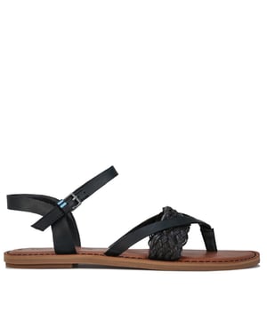 Sandales Toms Lexie pour femme en noir.<BR><BR>- Dessus en cuir.<BR>- Design slip-in.<BR>- Lanière de cheville ajustable avec boucle TOMS en métal.<BR>- Sandales plates d'inspiration gladiateur.<BR>- Assise plantaire matelassée en cuir apporte un amorti léger.<BR>- Semelle extérieure personnalisée TOMS moulée en caoutchouc  inch inchLexie inch inch.<BR>- Dessus en cuir, Doublure textile, Semelle synthétique.<BR>