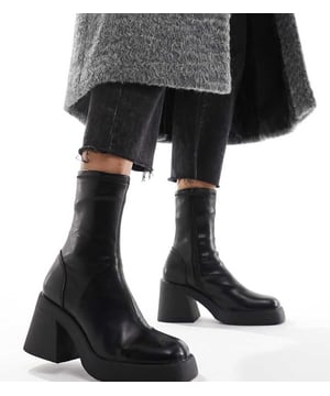 Shoes by ASOS DESIGN Reboot in progress Zip-side fastening Sock-like cuff Square toe Chunky sole Mid block heel Wide fitSold By: Asos