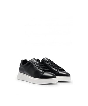 Polished-leather trainers by BOSS, made in Portugal and featuring a lace-up closure and branded rubber sole.
LacesFully linedPackaging: Box
100% Cow skin, 100% Polyester, Sole: 100% Rubber, Upper material: 100% Cow skin, Innersole: 100% Goat leather
&nbsp;
50497887
&nbsp;
&nbsp;
