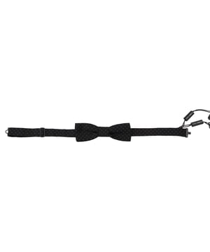 Prachtig gloednieuw met tags
  Exclusieve Dolce & Gabbana collectie
  Kleur: Zwart met patroon
  Model: Gebonden
  Materiaal: 100% Zijde
  Verstelbare nekband
  Een maat voor iedereen
  Vervaardigd in Italie