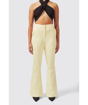Brighten up your wardrobe with the Fiore Trouser in Lemon Yellow. A vibrant new addition to the Twisted Tailor Womenswear Collection. Made from a cotton blend, it's the perfect flared trouser for any upcoming occasion. It features a light contrasting jacquard print for added impact. Pair it with the matching Fiore Jacket in Lemon Yellow to tick all of the boxes.
Model is 5'6" (168cm), chest 32" (81cm), waist 27" (69cm) and wearing a size 8.