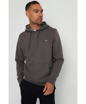 This pull-on hoodie from Threadbare features a kangaroo pocket, elasticated cuffs and hem and an adjustable drawstring hood. Style simply with a pair of matching joggers for laidback loungewear, or team with jeans and trainers for a casual outfit for your weekend outings. Made in a cotton blend fabric to ensure a really comfortable feel. Other colours and matching items available.