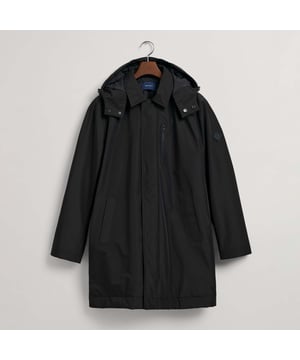 The Padded Car Coat is a modern silhouette that's ideal for morning commutes and rainy weekends. Tailored in a cotton-feel polyester with a water-resistant finish  this coat features quilted lining for warmth  a detachable hood  and a zip front with press buttons for extra protection. The coat has three interior pockets as well as two slanted pockets at the front for valuables.