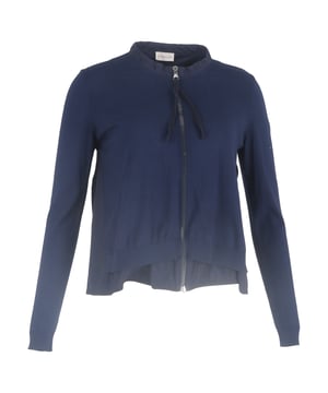 VINTAGE, RRP AS NEW
Add a touch of feminine sophistication to your wardrobe with the Moncler Ruffled Collar Zipped Cardigan in navy blue wool. This luxurious cardigan combines modern design with classic comfort, crafted from soft, breathable wool that provides warmth and a cozy feel, while the rich navy blue hue offers timeless versatility.

 Moncler Ruffled Collar Zipped Cardigan in Navy Blue Wool

Condition: Excellent
Signs of wear: No retail tag but Brand tag on., No visible sign of wear., 
Packaging: None
Color: Blue | navy blue
Material: Wool
Size: INT | L/UK14/IT46/US10/FR42
Measurements: Length: 550
SKU: NAPPUGBCL444354W