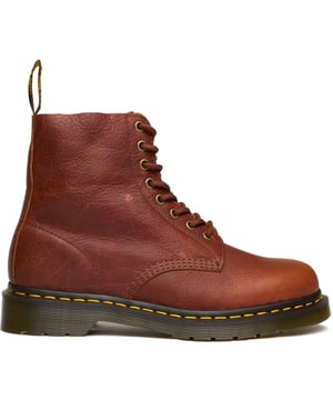 The Tan Dr. Martens 1460 Pascal Ankle Boots Bring It To The Point - Timeless, Stylish, Alternative, With A Premium Leather Upper, The Iconic Yellow Stitching And The Famous Air-cushioned Airwair Sole, Which Gives Them The Real Doc Martens Edge. Featuring Goodyear Welt And A Rugged Treat For Enhanced Durability And Sturdiness, These Boots Definitely Stand Out From The Crowd.
