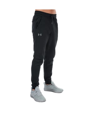 Mens Under Armour UA Rival Fleece Fitted Jog Pants in black.- ColdGear fabric traps heat and wicks sweat to keep you warm  dry and light.- Super soft  cotton-blend fleece with brushed interior for extra warmth.- Elasticated waist with drawcord.- Mock fly detail.- Front slant pockets.- Rear pocket with snap closure.- Under Armour branding at right thigh.- Tapered leg.- Ribbed cuffs.- Fitted fit; next to skin without the squeeze.- 80% Cotton  20% Polyester.  Machine washable.- Ref: 1309818-001