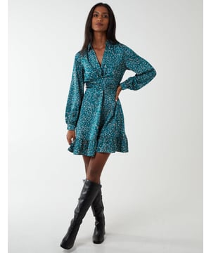 Enjoy a cocktail with friends with this Wrap Bust Mini Shirt Dress. The waist belt will help make this dress perfectly suit your figure, and its abstract print and v neckline will make you stand out from the crowd. Don't forget to match this dress with high knee boots for a killer look! 
100% polyester
