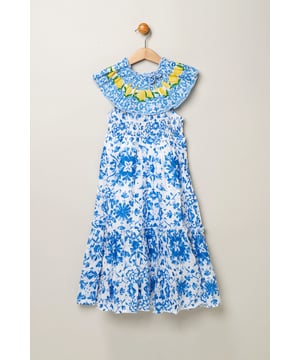 Let your little one embrace sunny days in this refreshing Miss dress showcasing a charming tile print! This shirred dress features delightful lemon details around the neckline, adding a pop of citrusy charm. Perfect for playful adventures, it's a sweet addition to your little one's wardrobe, radiating summery vibes wherever she goes!