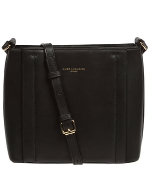 The 'Kali' cross body bag from Pure Luxuries London's Knightsbridge Collection is handcrafted from gold standard Nappa leather with a super-soft and smooth finish. The zip-over top opens to reveal a 100% cotton interior. The spacious compartment features four card slots to help maintain an organised bag. A slip pocket on the front of the bag provides on-the-go storage. Features gold-coloured metal fittings and zips alongside the adjustable slim leather strap with a maximum drop length of 65cm. The Pure Luxuries logo is embossed in gold foil for a beautifully simple finishing touch.