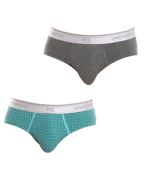 Pack-2 Slips Kisses&Love
 Elastic rubber waistband.
 Detail of the brand name on the waistband.
 Breathable fabric.
 Anatomical front with the ability to hold without squeezing.
 Seams seen in tone.
 Composition: 95% Cotton, 5% Elastane
 Care:
Wash at maximum temperature 30º.
 Dry at low temperature.
 Do not use bleach.
 Do not iron.
 Do not dry clean.