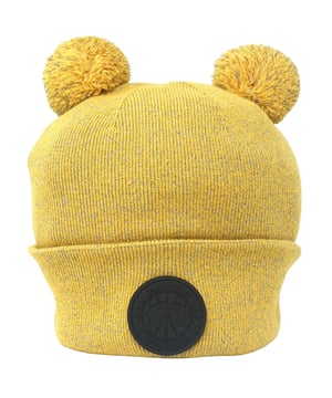 Canada Goose X Angel Chen Double Pom Toque Yelllow Beanie. This Canada Goose Logo yellow Beanie will keep you warm and stylish all season. Featuring a double pom and brand logo, it's perfect for adding a stylish touch to any winter look. Stay fashionable and cozy!. 100% Wool, Made In Italy. Stretching Fit, Angel Chen Collection, Beanie Hat. Regular Fit, Fits True To Size. Style: 8820LC 1039