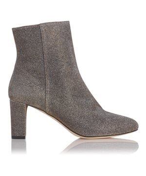 Embellished evening boots offer new ways to work daytime favourites into an after-dark wardrobe and this season we love the sparkling appeal of these bronze lurex Leelah boots. Finished with a strikingly simple almond-shaped toe, these boots deliver a wearable 100mm block heel and are cut just above the ankle. Wear to give summer florals or an abstract print dress added edge. Tailoring is revitalised with modern cool while frayed denim is given an Eighties twist. Slip them on and transform your look in one chic step.