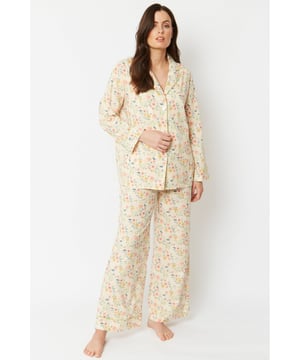 100% Cotton Nightwear

Comfortably fits sizes 8-12

Prepare for sound Summer slumbers in lightweight, breathable cotton nightwear. Featuring a feminine floral pattern with contrast piping, button up front and elasticated trousers.

Our new collection of loungewear is also ideal for day to day styling with your favourite outerwear pieces. The full length sleeves and pockets add a touch of practicality to you day look with the benefit of bedtime snack storage.