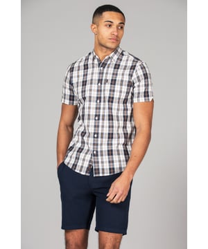 Brighten up your wardrobe with this checked shirt from Tokyo Laundry. Made from 100% cotton, this short-sleeved shirt is perfect for any occasion. The classic design features a comfortable fit and button fastening. Add this versatile staple to your wardrobe today. Machine washable for easy care.