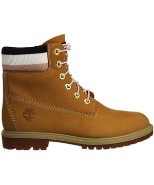 The Timberland 6-Inch Heritage Cupsole Women's Brown Boots are a stylish and versatile choice for women who appreciate both fashion and durability in their footwear. Here are the key features of these boots:

 Brown Nubuck Leather:  These boots are typically crafted from premium brown nubuck leather, known for its soft, velvety texture and durability. Nubuck leather offers a rich and stylish appearance.

 Classic 6-Inch Height:  These boots feature the iconic 6-inch height, which provides ankle support, making them suitable for various outdoor activities and urban adventures.

 Padded Collar and Tongue:  The boots come with a padded collar and tongue for added comfort, reducing the risk of chafing or discomfort during extended wear.

 Lace-Up Closure:  Typically, these boots feature a lace-up closure system with rustproof hardware, allowing you to achieve a secure and customized fit while ensuring long-lasting durability.

 Cushioned Footbed:  Some Timberland boots, including the Heritage Cupsole line, come with a cushioned footbed for enhanced comfort during all-day wear.

 Cupsole Construction:  The cupsole construction provides reliable support and stability while maintaining a sleek and stylish profile.

 Versatile Style:  These boots are designed to be versatile, suitable for a range of outfits and occasions, from casual outings to outdoor adventures.

 Timberland Branding:  These boots often feature Timberland branding details, such as the iconic Timberland tree logo on the side, tongue, or heel, representing the brand's commitment to quality and style.

 Durable Rubber Outsole:  The rubber outsole offers traction and grip on various surfaces, making these boots practical for urban and outdoor use.

In summary, the Timberland 6-Inch Heritage Cupsole Women's Brown Boots are a blend of style and durability. With their premium nubuck leather, classic design, and comfortable features, they are a versatile addition to your wardrobe, suitable for both everyday wear and outdoor activities. These boots represent Timberland's tradition of quality and timeless style for women who appreciate both fashion and function in their footwear.