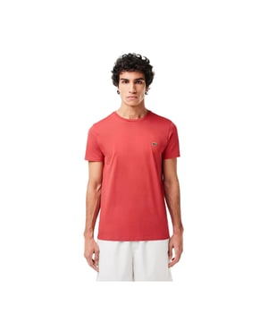 The essential tee-shirts of Lacoste wardrobe Our iconic crewneck tee-shirt in Pima cotton jersey renewed every season in a new large color palette Regular fit  natural ease on body Premium soft Pima cotton Lacoste Men SPW transfer print inside neck at back 2 5cm green crocodile on chest.