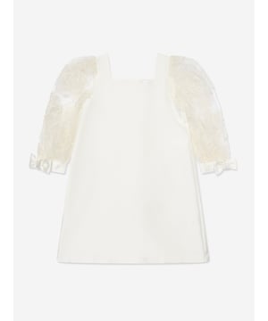 Mama Luma incorporate beautiful eco-friendly materials into their sophisticated handmade constructions. This girls ecru dress is reflective of the Californian label's precision of beauty and preference for traditional abstracts. Engineered in a handmade design. It showcases a square neckline, mesh intricate floral stitching down the sleeves, and bows.‚ Cotton Lining ‚ 100% Polyester