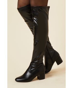 Over-the-knee design for a bold, statement look
        Stretch faux leather material for comfortable fit
        Block heel measuring between 5 and 6.5cm for stability
        Sleek, streamlined silhouette
        Side zip closure for easy on and off
    
    Make a striking impression with the Kasmira High Block Heel Stretch Over The Knee Boot. These boots are designed to turn heads while offering comfort for all-day wear. The stretchy faux leather material hugs your legs, creating a flattering silhouette that works wonderfully with mini skirts, dresses, or skinny jeans. The mid-height block heel provides just the right amount of lift without sacrificing stability, making these boots perfect for brunch dates or casual outings with friends. Style them with an oversized jumper dress for a chic autumn look, or pair them with a flowy midi skirt and fitted top for a more polished ensemble. Whether you're heading to a family gathering or meeting mates for coffee, these versatile boots will keep you looking stylish and feeling confident.