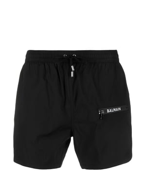 Italy-made, these swim shorts from Balmain fasten at the waist with a drawstring. The brand's logo is methodically applied to the zip pocket for a playful touch.


Made in Italy
Size/fit : This item fits small. We recommend taking at-least one size up.