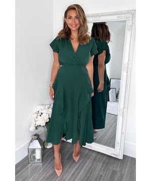 Our Teal Frill Detail Double Split Skirt Midi Dress is right on trend
this season! Featuring a v neck wrap top, short frill sleeves, a frill
detail double split skirt and a zip up back.  Style with heels and a
matching bag. 

Model wears: UK 8/ EU 36/ US 4
Model's height:  165cm/ 5'5"
Approx length from centre back to hem: 134cm
Fabric composition: 100% Polyester
Colour: TEAL