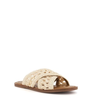 Take your warm-weather styling to the next level with flat crochet sandal, Level. Detailed with a fully lined footbed for added comfort, the upper of this effortlessly chic style culminates with two wide cross-straps.