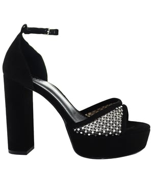 Elevate your footwear collection with the opulent and glamorous Ted Baker Bexins Crystal Mesh Women's Black Platform Sandals. These statement sandals seamlessly marry luxurious design with contemporary flair, ensuring you stand out with every step. Here are the key features that make these platform sandals a must-have for the fashion-forward:

Key Features:

 Crystal Mesh Embellishments:  The Ted Baker Bexins Sandals are adorned with exquisite crystal mesh detailing, adding a touch of sparkle and glamour to your look. This opulent embellishment reflects Ted Baker's commitment to creating pieces that exude luxury and sophistication.

 Platform Sole:  Step into elevated style with the platform sole design. Not only does it add a trendy and modern touch, but it also provides extra height without compromising on comfort. The platform design makes these sandals a bold choice for both casual and more formal occasions.

 Adjustable Ankle Strap:  Enjoy a secure and customized fit with the adjustable ankle strap. This feature adds both practicality and style, allowing you to tailor the fit to your comfort while maintaining the sleek look of the sandals.

 Comfortable Insole:  Despite the elevated platform, these sandals prioritize comfort. The well-cushioned insole ensures that you can confidently wear them for extended periods, making them suitable for various occasions.

Step into the spotlight with confidence and style wearing the Ted Baker Bexins Crystal Mesh Women's Black Platform Sandals – a captivating blend of luxury, contemporary design, and comfort. These sandals are the perfect choice for those who want to make a statement with their footwear.