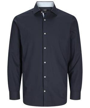 Ontdek het ultieme statement voor je stijlvolle verschijning met dit tijdloze herenoverhemd. Met zijn flatterende slim fit en klassieke Kent-kraag geeft het je een opvallend silhouet. De knoopsluiting voegt een geraffineerd accent toe, terwijl de verstelbare manchetten met 2 knopen een perfecte pasvorm garanderen. Dankzij de hoogwaardige materialen en zorgvuldige afwerking geniet je de hele dag van ongeëvenaard comfort. De contrasterende kraag voering voegt een stijlvol accent toe en benadrukt je persoonlijkheid. Op kantoor of bij speciale gelegenheden - dit overhemd is uw trouwe metgezel voor een zelfverzekerde uitstraling. Trakteer uzelf op de luxe van tijdloze elegantie en topkwaliteit in één enkel kledingstuk.