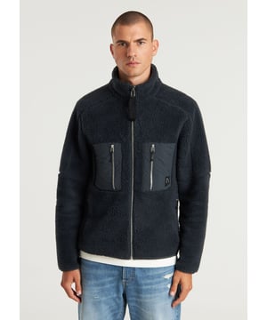 Fit & Material The Paxton is a short model mid-season jacket made of 100% polyester. This makes the jacket feel soft. Inside, the jacket has a polyamide fleece lining, which keeps you warm and makes it windproof.  Performance Features  Breathable Keep-warm Quick dry Windproof Details The entire exterior of the jacket is knitted in a teddy fabric. The jacket features 2 chest pockets and 2 side pockets, all 4 with zippers. Additionally, there is a stand-up collar, double zipper, and our signature CHASIN' details.  Specs  Regular fit Teddy fabric Fleece lining Soft feel Double zipper 4 zippered pockets CHASIN' details