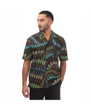 Heren Marcelo Burlon Allover Print Veren overhemd in bruin.- Gespreide kraag.- Korte mouwen.- Volledige knoopsluiting.- Borstzak.- Veren motief all over.- Rechte zoom.- Stof: 100% Katoen. Details: 100% polyester.- Ref: CMGG0010016055