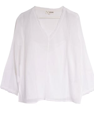 Cool and simple but far from basic. Floaty and feminine v neck top crafted from woven cotton. With a cool, oversized fit finished with deep v neckline, frayed neck and cuffs. Seam detail down the front and back. It's the perfect summer staple.
Fit: Regular, Sizing: Generous - if between sizes you may wish to go one size down