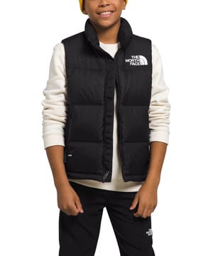 The North Face Nuptse levert al sinds 1992 warmte die het spel verandert en geen enkele andere jas is zo natuurlijk van de bergen naar de straten van de stad gereisd. - - .   Het 1996 Retro Nuptse Gilet voor tieners is een moderne reïncarnatie van het icoon, gemaakt voor jongvolwassenen. - - .  We hebben de meeste dingen hetzelfde gehouden: hetzelfde gedrongen silhouet, dezelfde glanzende ripstop stof, dezelfde zichtbare ritssluiting en diagonale handzakken en natuurlijk dezelfde oversized baffles. - - .  De enige verandering is de upgrade naar 700-fill dons van verantwoorde herkomst. - Hij is ook gemaakt van gerecycled materiaal, dus vriendelijker voor de natuur. - - . Buitenkant: 100% Nylon, Voering: 100% Polyester, Vulling: 90% Dons, 10% Waterwildveren.