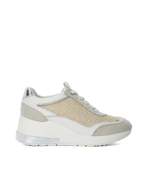 Elevate the everyday with our ever-popular wedge trainer. Ellming has been designed with contrasting panels which adds texture and a subtle sheen. The heel has been accented with a metallic insert and the side panel matches back to the detail on the rear of the heel. The addition of the metallic logo eyelets that match the trim adds to the luxe factor.