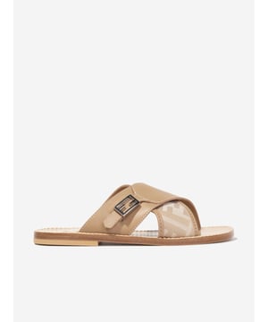 Introducing the high-end symbol of elegance, the Girls Leather FF Logo Sandals in Beige by Fendi. This Italian-made designer footwear is perfect for your little fashionista's Summer look. Here are the standout features: Italian Craftsmanship: Immaculately designed in Italy for a durable and long-lasting wear. Signature FF Logo: The trendy FF Logo by Fendi adorns the sandals adding a distinguished style statement. Supreme Comfort: Created with high-grade leather ensuring a comfortable stride on all summer adventures. Upgrade Your Wardrobe: Enlighten your girl's collection with the chic FF Logo Sandals in Beige. Shop now for distinct elegance and timeless style!