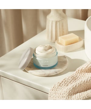 "Improves skin’s hydration, texture, radiance, and tone. Indulge in ESPA’s Tri-Active Regenerating Smooth & Firm Body Butter, an age-defying treat for silky radiance. 

This rich body butter contains powerful natural actives to help firm, smooth, and nourish skin so it feels supple, firm, and replenished. 

Discover an age-defying, nurturing blend of brightening and smoothing Bio Retinol from Bidens Pilosa, revitalising and plumping Sea Amber, toning and firming Pumpkin Seed, and powerful Larch polysaccharides to help protect the skin’s natural moisture barrier for supple radiance. 

Enhanced with a nourishing blend of Rosehip and Argan oil to comfort and moisturise the skin. These essential fatty acids leave skin feeling soft, smooth, healthy, and hydrated. 

Featuring an essential oil blend of Mandarin, Patchouli, and Rose Geranium for an elevated Aromatherapy experience. 


Key Ingredients: 

•	Bio retinol (from bidens pilosa) – skin looks brighter and healthier. Age-defying for visibly smooth skin. 
•	Pumpkin seed extract – restores feeling of firmness to skin 
•	Larch – protects skin’s natural moisture barrier function helping it to feel supple 
•	Sea amber – hydrates and moisturises for skin which feels plumped and smooth 
•	Nourishing blend of rosehip and argan oil – replenishes skin with precious lipids helping to prevent dryness 
•	A fragrant essential oil blend of mandarin, patchouli & rose geranium – revives and restores the senses. 


Key Benefits: 

•	Rich And Velvety Body Butter Transforms into A lipid Rich oil 
•	Skin feels supple 
•	Skin feels firmer 
•	Skin feels softer and smoother 
•	Skin appears firmer 
•	Skin feels more toned
•	Skin is left with a feeling of bounce and plumpness to skin 
•	Skin feels hydrated 
•	Skin feels intensely moisturised, nurtured and nourished 
•	Skin looks brighter, radiant and healthy 
•	Skin feels restored and protected with moisture"