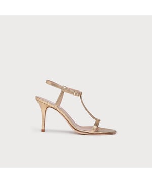 A brand new style for SS20, our North sandals are a chic 'barely there' design. Crafted in Italy from soft gold leather, these minimalist sandals have a stylish T-bar, delicate ankle strap and a slender 85mm stiletto heel. They're perfect for the summer occasion season.