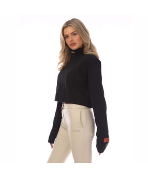Dames Heron Preston CTNMB Cropped Rollneck T-Shirt in zwart - wit.- Rolhals.- Lange mouwen.- Geborduurd merkopdruk.- Geweven merkpatch.- 100% Katoen.- Ref: HWAB026C911001