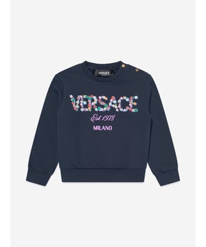 Introducing the exquisite Baby Girls Flower Logo Sweatshirt in Navy by Versace, crafted in majestic Italy, promising unparalleled sophistication for AW2024. Here‚ why it‚ essential:‚ **Italian Craftsmanship**: Impeccably made, promising resilience and enduring charm.‚ **Chic Flower Design**: Elevates any outfit with its stylish, playful flair.‚ **Luxurious Comfort**: Constructed from superior fabrics to pamper and soothe.‚ **Iconic Versace Appeal**: Instantly recognisable, adding an exclusive touch.Elevate her style with Versace‚ dedication to luxury and quality.